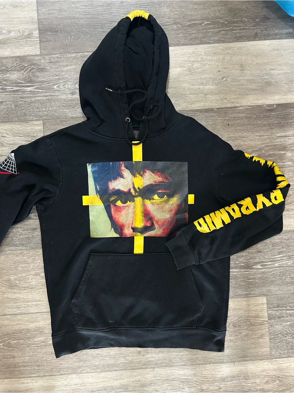Black Pyramid Graphic Hoodie with Yellow Accent